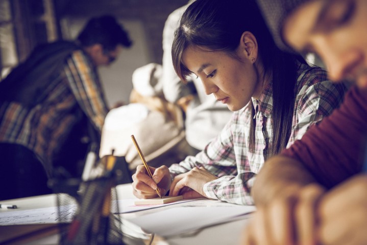 Woman writing at a desk